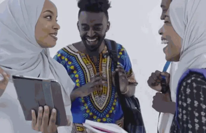 Four Black people talking and laughing.