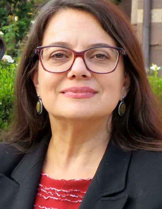 A woman posing for a professional photo.